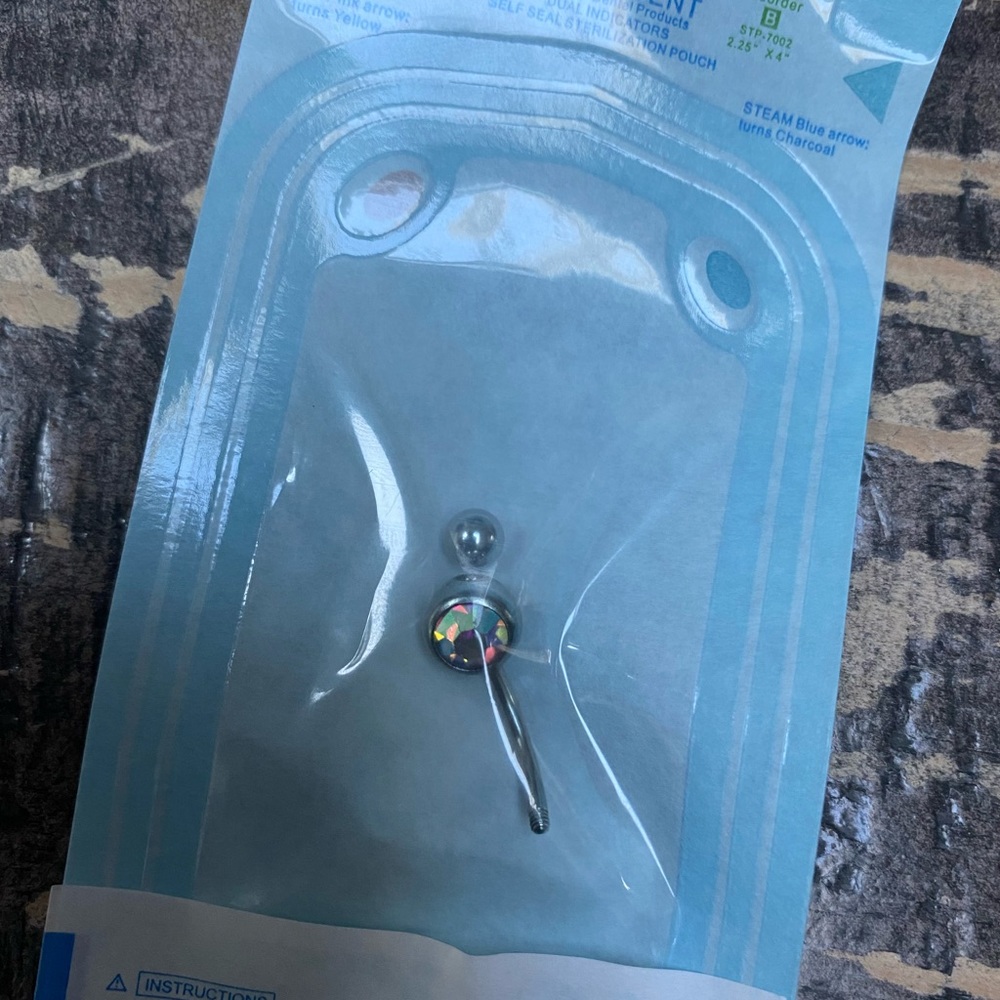 Belly ring.
